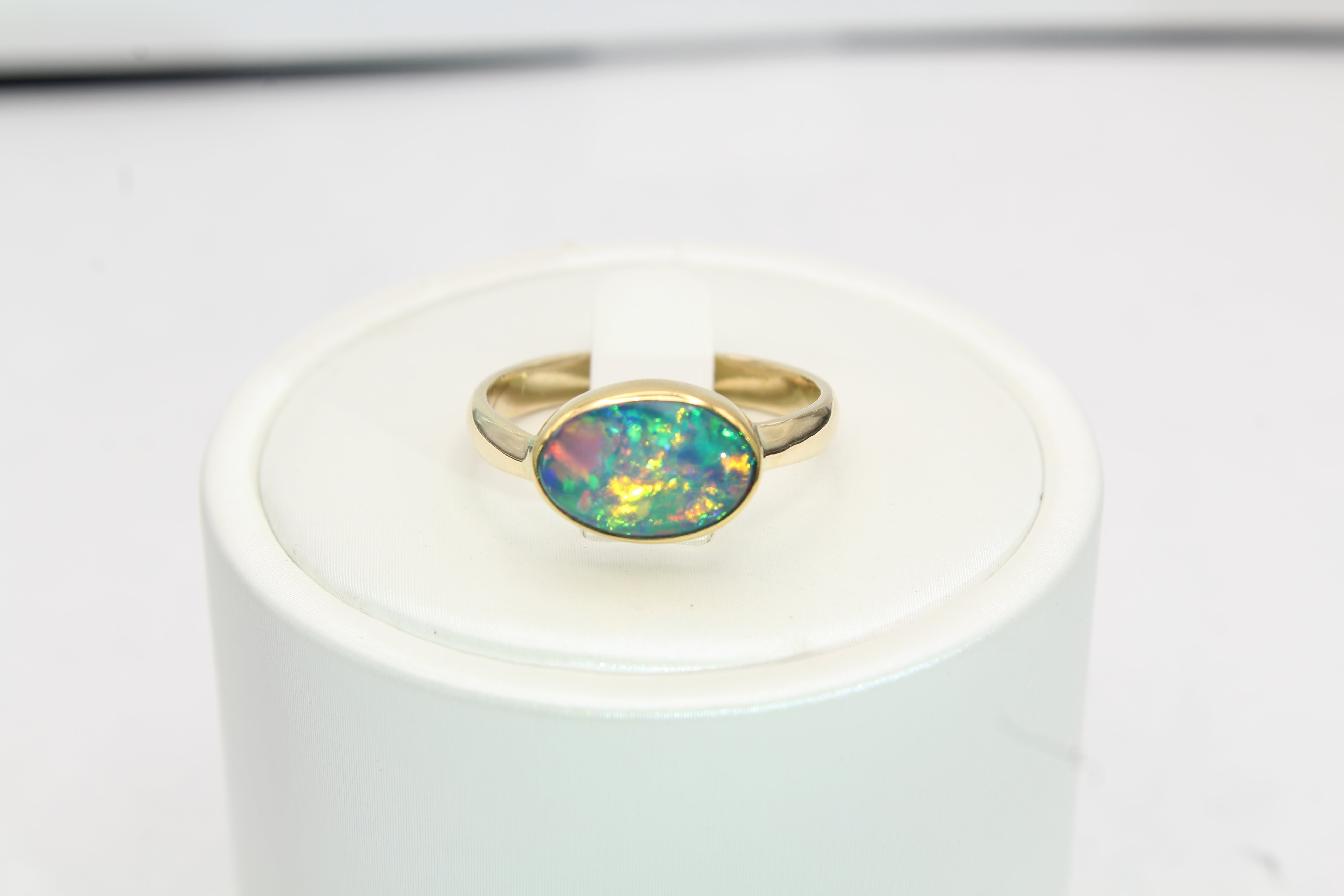 Oval Ethiopian Opal Ring with 22k Gold Bezel