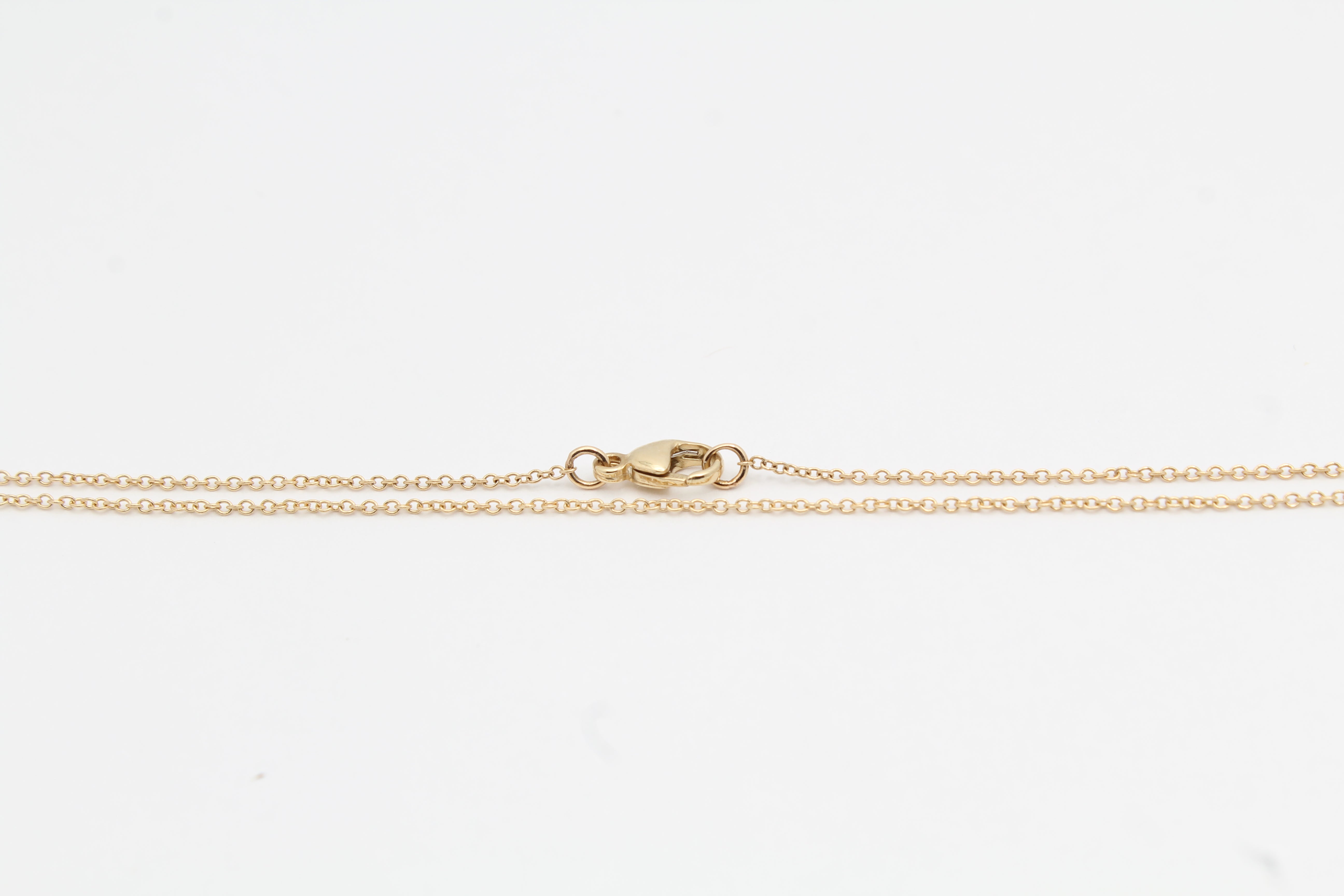 An 18 inch 14 karat gold cable chain with lobster clasp