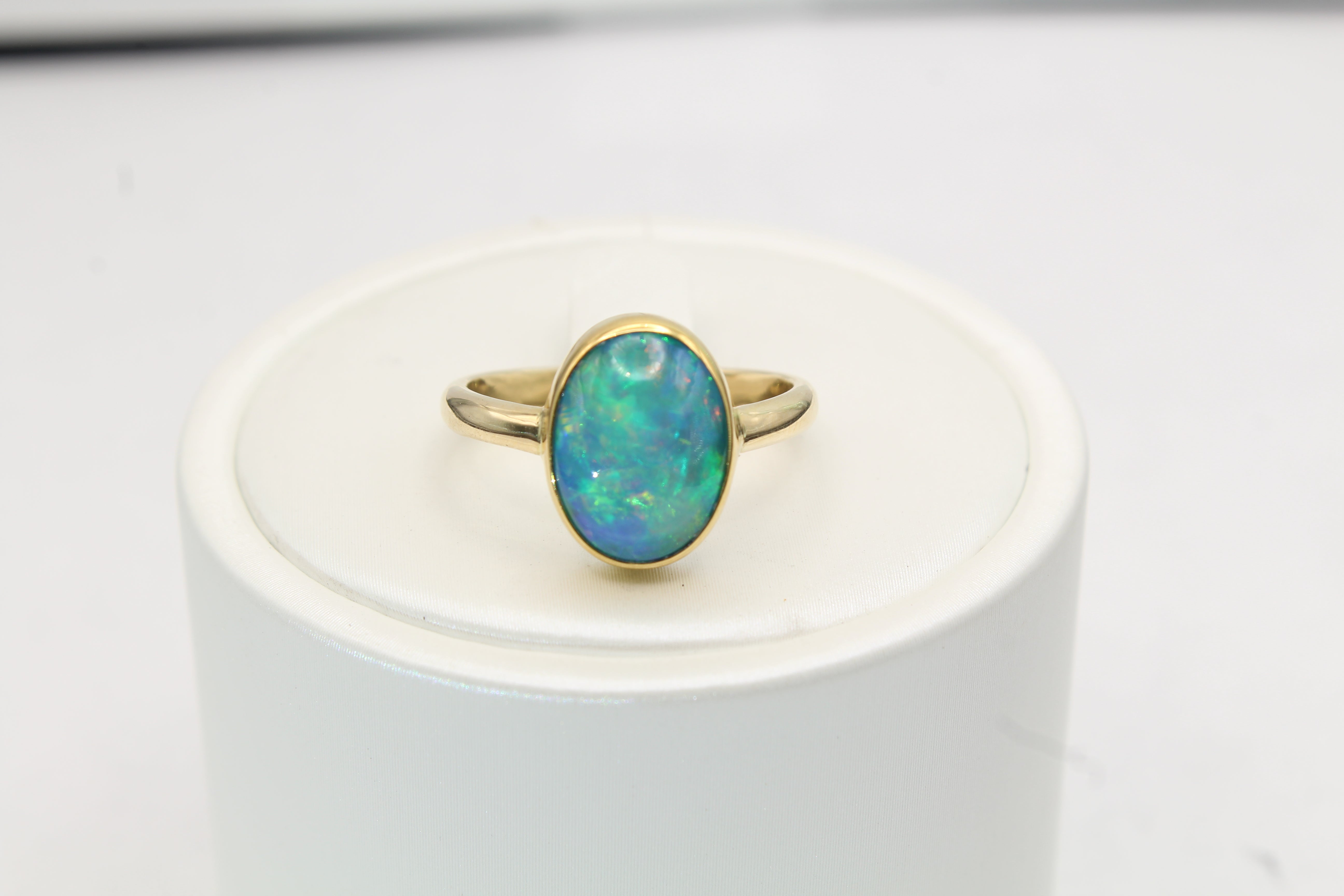 Ethiopian Opal Ring in Solid 14k & 22k Gold | Oval Bezel Set