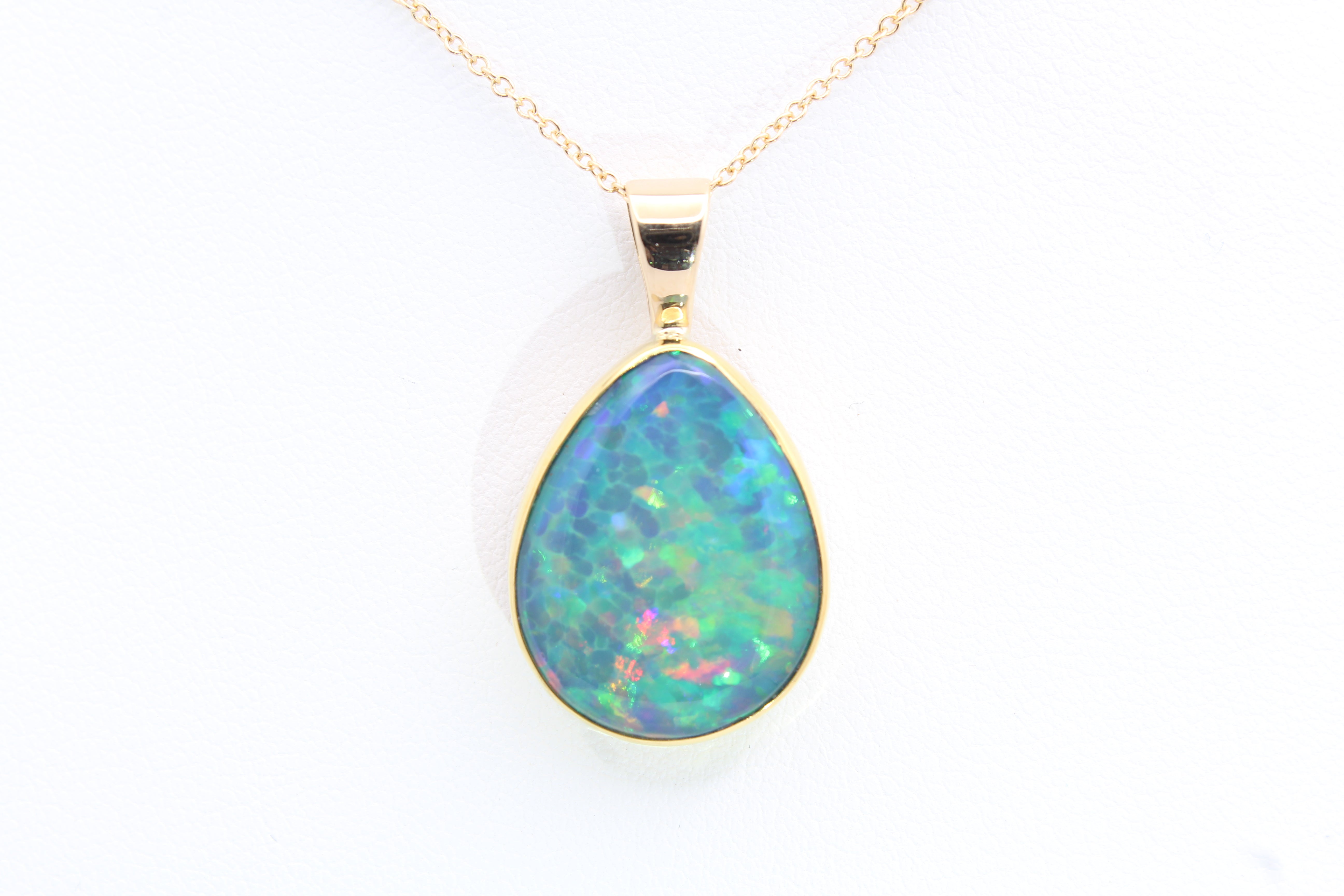 Ethiopian Opal Pendant in 22k Gold Bezel with 14k Bail
