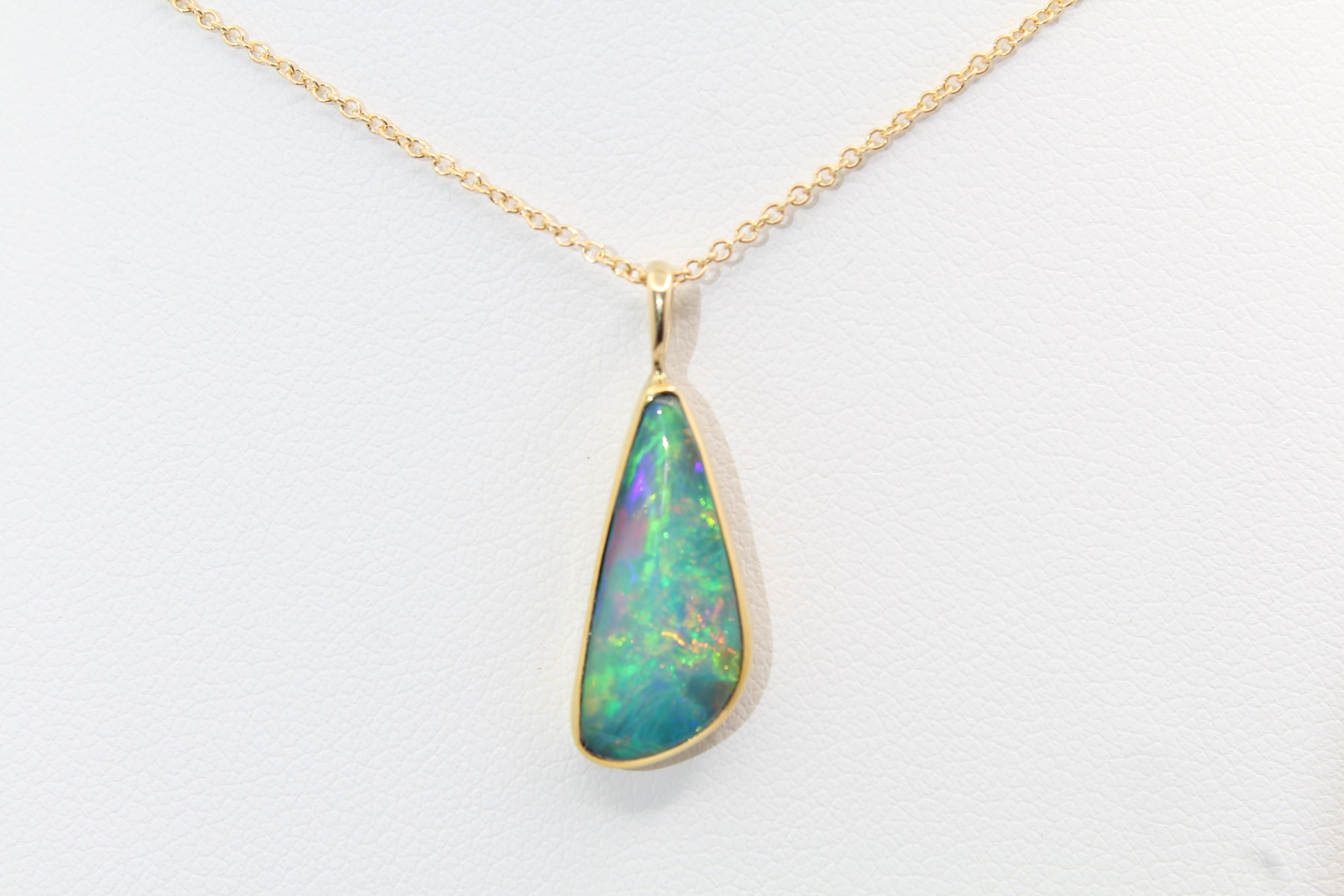 Radiant Ethiopian Opal Pendant | Solid Gold Design