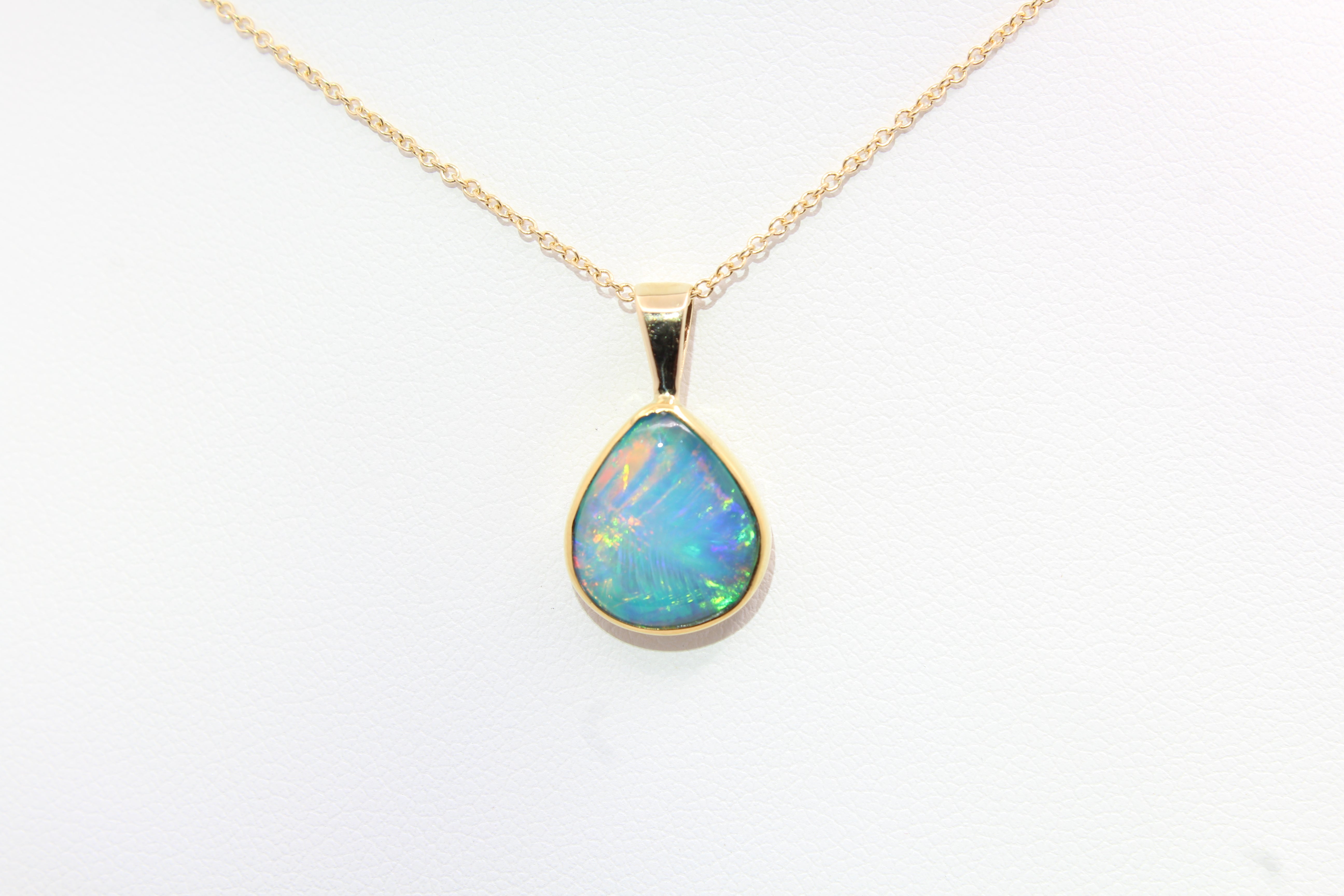 Unique Play-of-Color Ethiopian Opal Pendant | 22k & 14k Gold