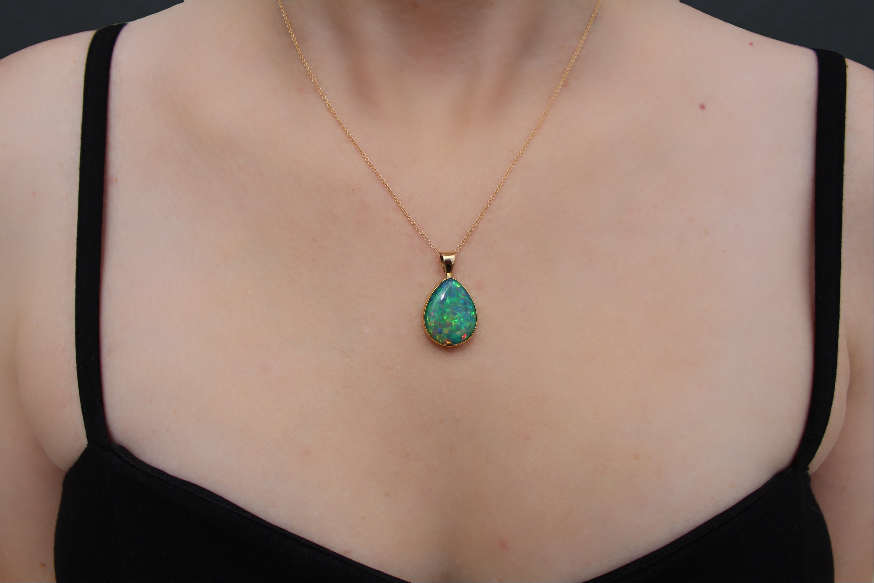 Ethiopian Opal Pendant in 22k Gold Bezel with 14k Bail